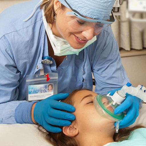 Pediatric anesthesiologist with a patient at Mayo Clinic in Jacksonville, Florida.