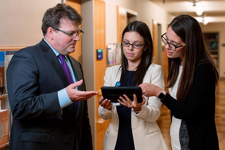 Pediatric Gastroenterology fellows talk to each other in the hall at Mayo Clinic in Rochester, Minnesota.