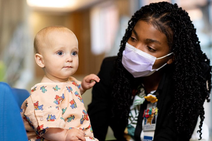 Pediatric Hospital Medicine fellow works with a patient at Mayo Clinic in Rochester, Minnesota.