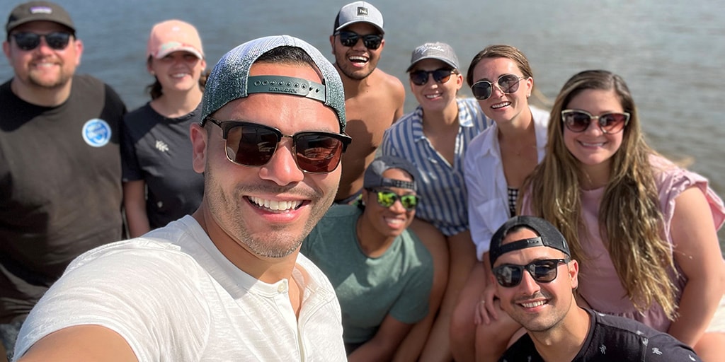 Physical Medicine and Rehabilitation residents enjoy boating down the river together during the summer