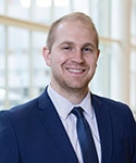 Headshot of Milan Oxspring, M.D.