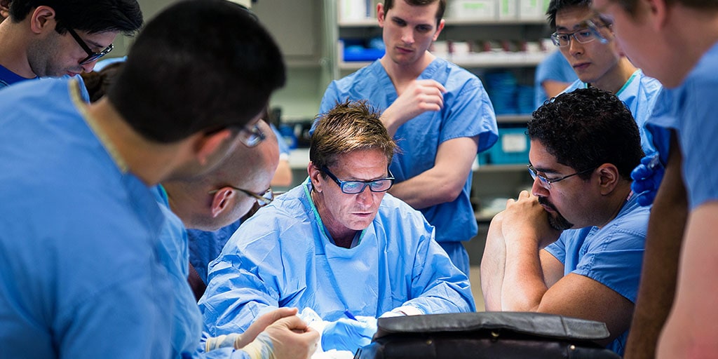 Plastic surgery residents learn from a visiting professor at Mayo Clinic in Rochester, Minnesota. 
