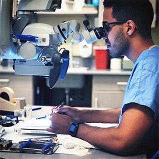 Plastic surgery resident working in the cadaver lab at Mayo Clinic in Rochester, Minnesota.