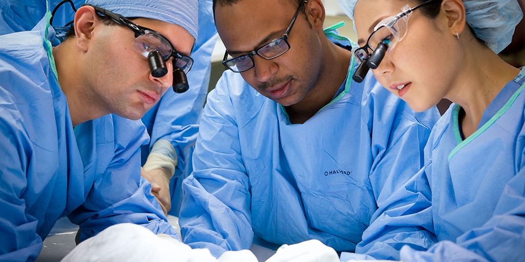 Plastic surgery residents in surgery.