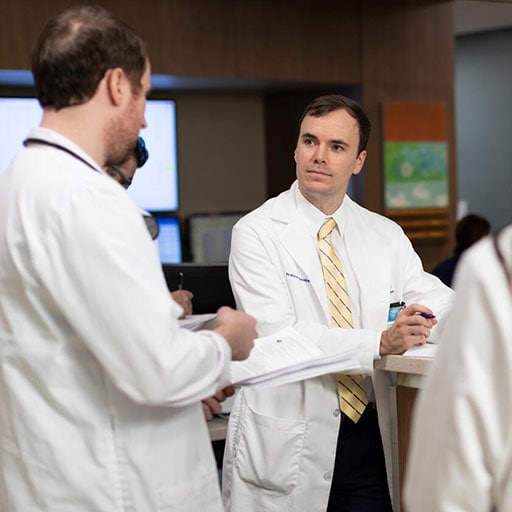 Internal Medicine residents participate in rounds at the hospital