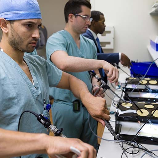 General surgery residents practice techniques in the skills lab