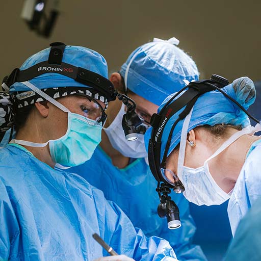 A urologist leads a team of surgeons in the operating room
