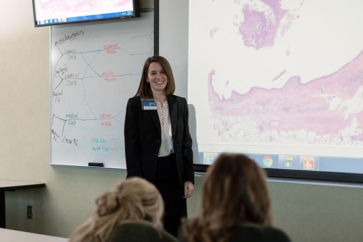 Pulmonary pathology faculty member presents to a classroom