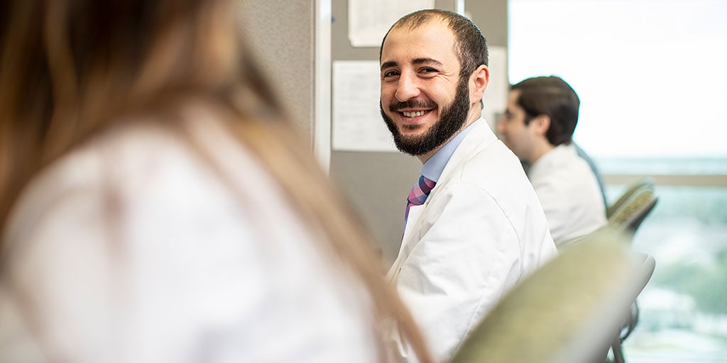 Renal transplant resident sitting in class in Jacksonville, Florida.