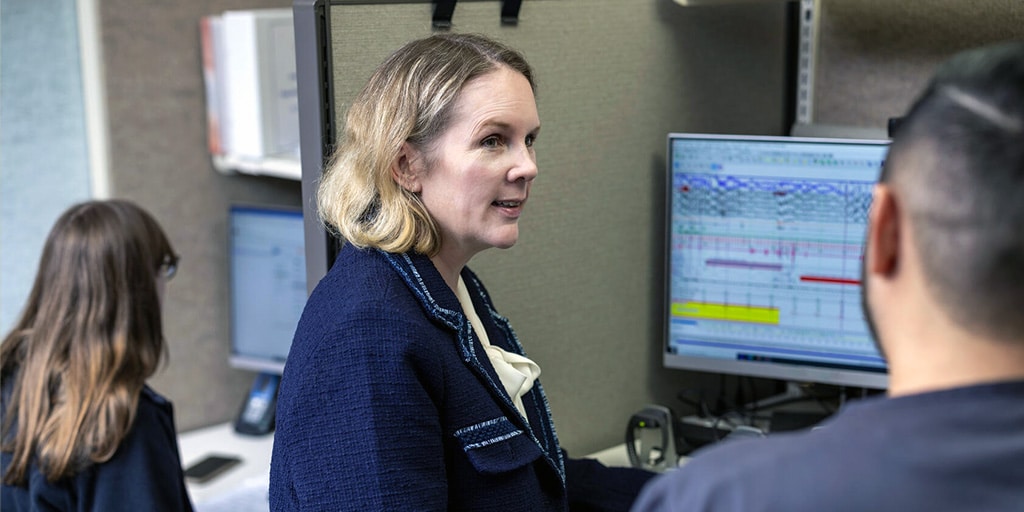 A Mayo Clinic resident reviews information with technologist