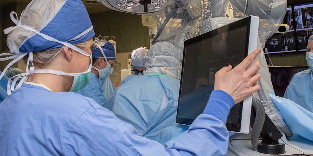 Spine surgery fellows in the operating room at Mayo Clinic in Rochester, Minnesota.