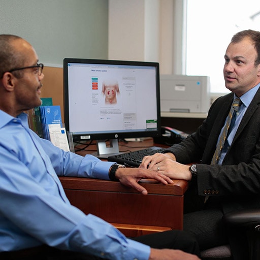 Urologic Oncology Fellowship faculty member speaks with a patient at Mayo Clinic in Rochester, Minnesota.