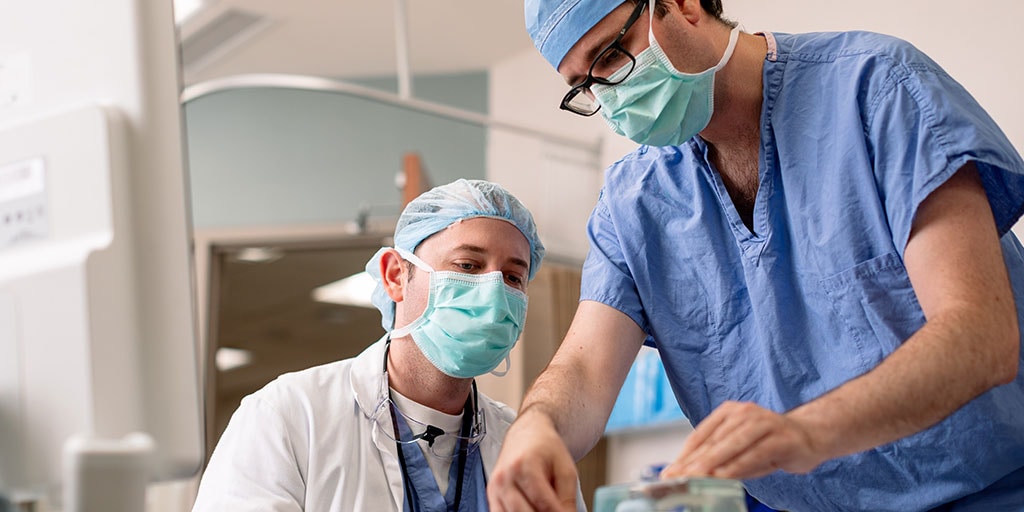 A urology resident works with his mentor at Mayo Clinic in Rochester, Minnesota.
