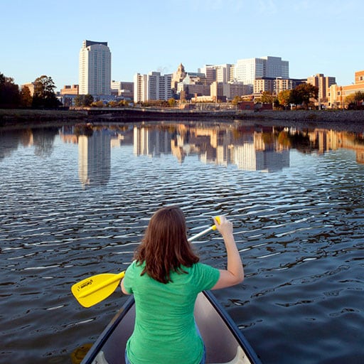 Woman kayaking in Rochester