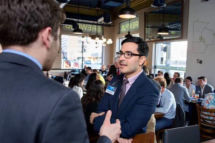 Students networking at a restaurant