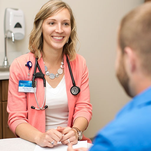 Mayo Clinic physician assistant listening to a patient