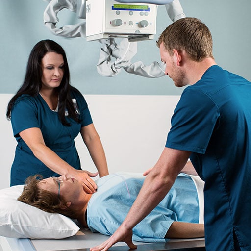 Mayo Clinic radiographers performing a scan on a patient